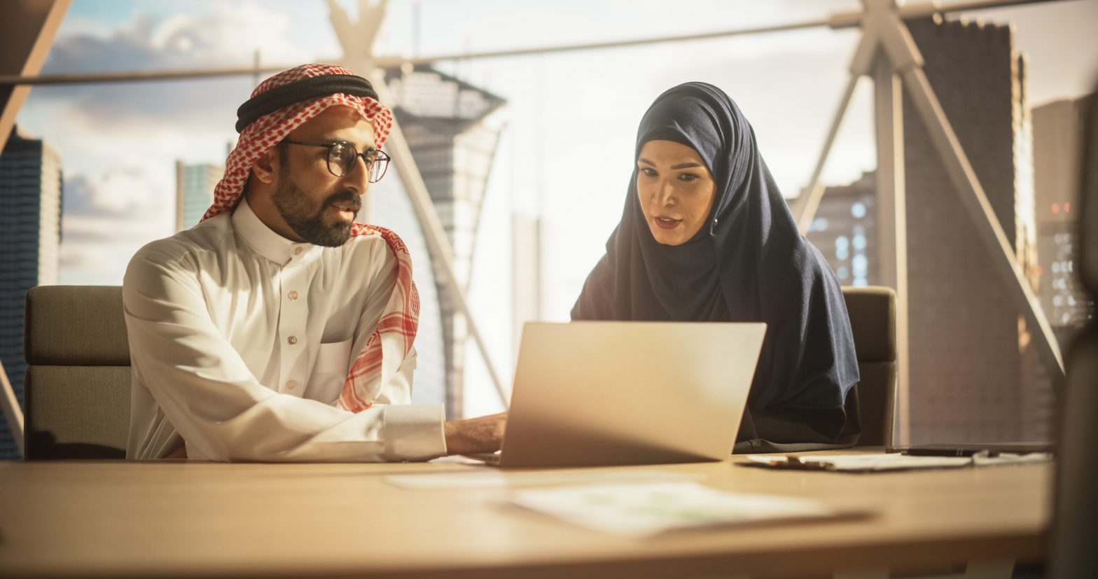 saudi business managers having a crucial conversation to boost productivity